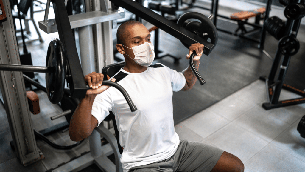 Black man doing weight training