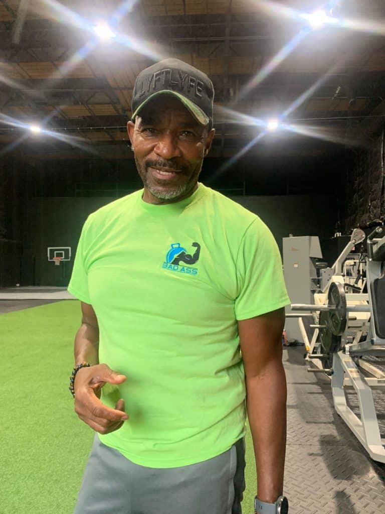 Nathaniel Wilkins wearing the Agelessworkout Badass club shirt