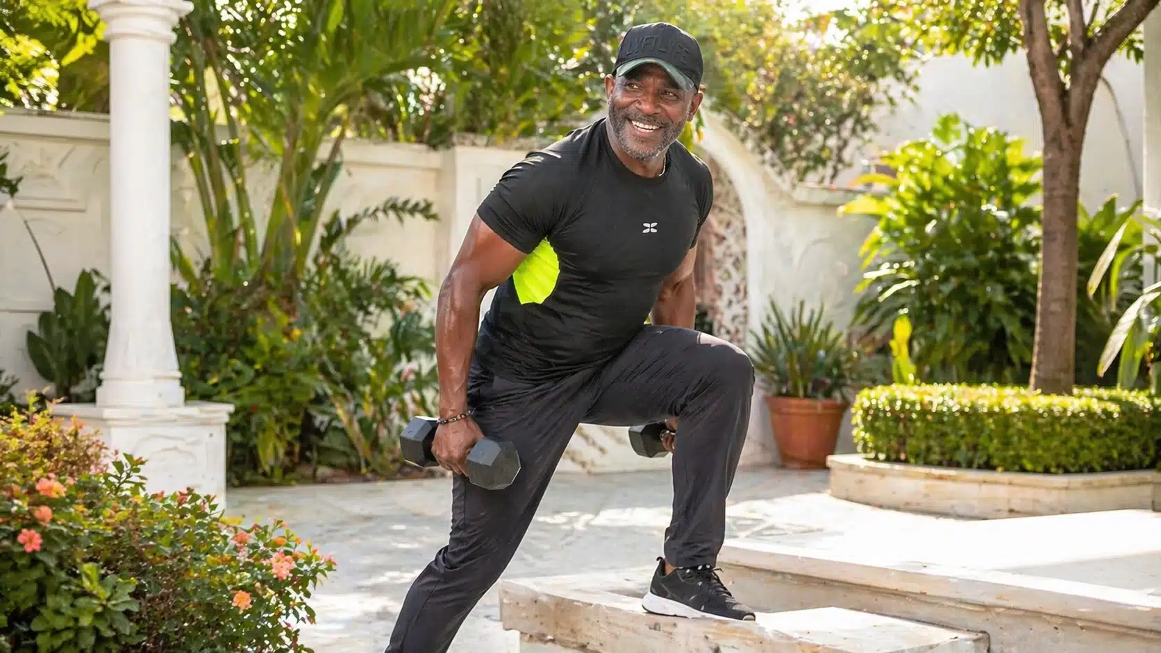 Man doing a dumbbell lunge outdoors for the Ageless Workout Move It for Bone Health program