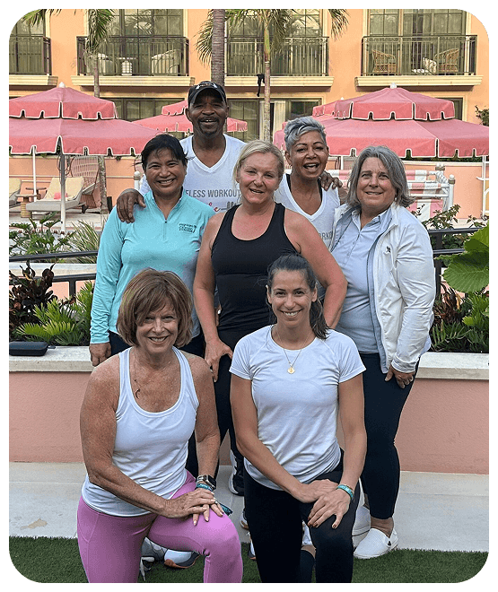 Ageless Workout coaches and community members posing together during a fitness and healthy aging event.