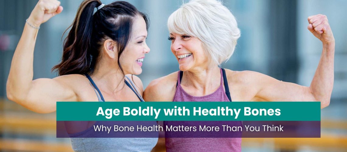 Two women, one with dark hair and the other with white hair, smiling and flexing their arms, symbolizing strength and healthy aging.