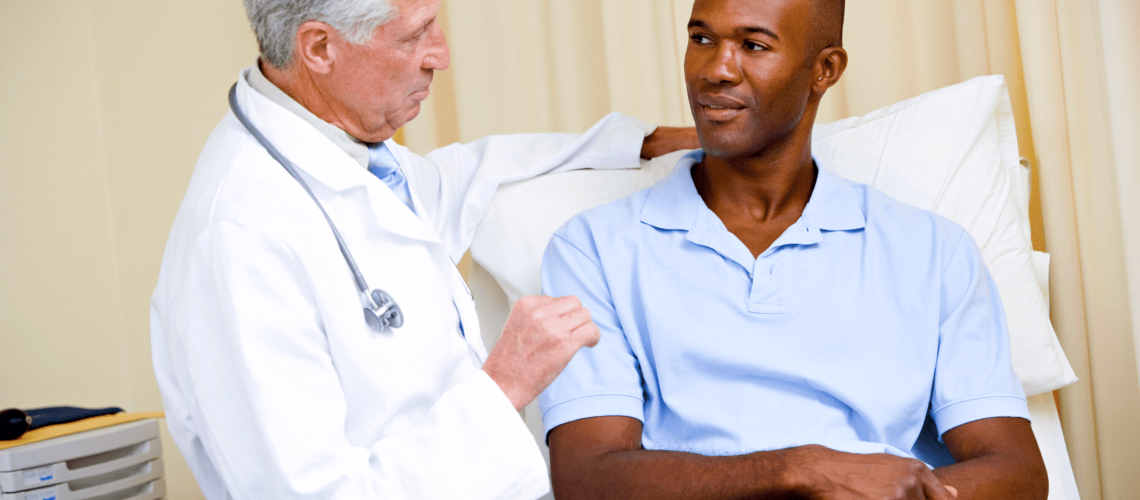 A doctor talking to a Black American man
