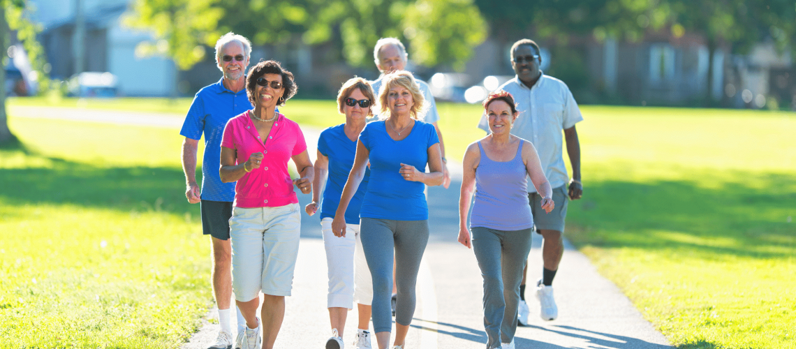 Group of Active aging seniors walking together